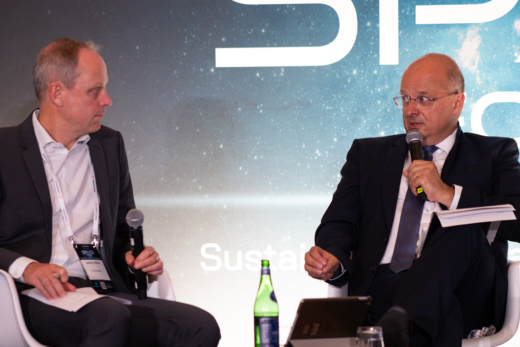 MEP Christophe Grudler (right) on stage at a previous European Space Forum. 