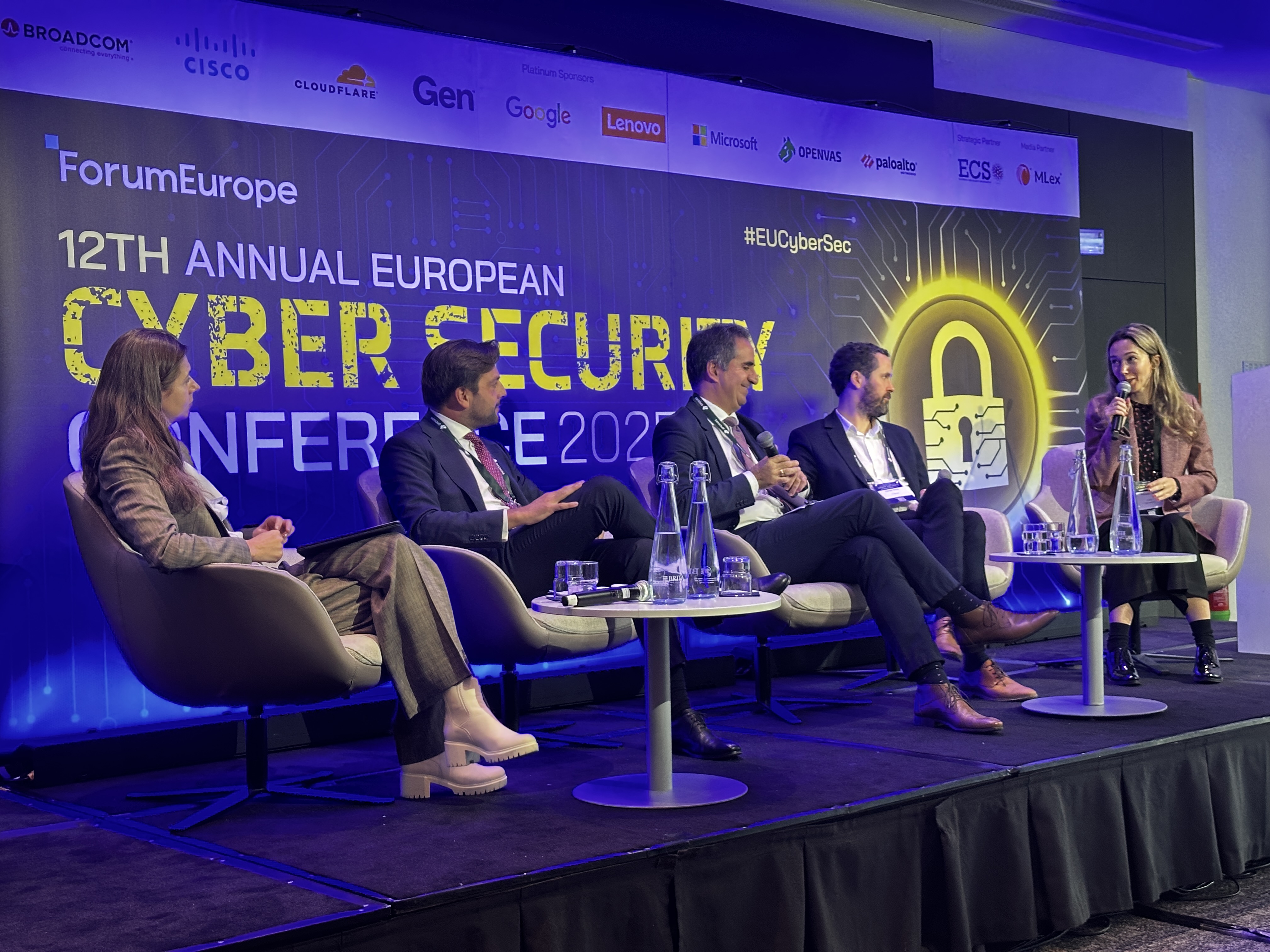 Ilias Chantzos, Broadcom, with the microphone in Session 1, 'EU Cybersecurity Policy at the Digital Decade’s Midpoint: Harmonisation, Implementation, Simplification and Future Directions.'